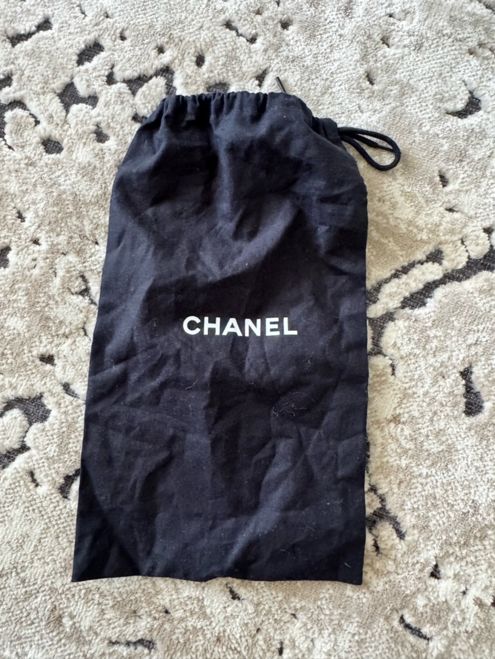 CHANEL Black Drawstring Pouch with White Logo